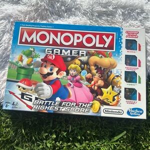Super Mario Monopoly Gamer Board Game 
Mario, Princess Peach, Donkey Kong, Yoshi